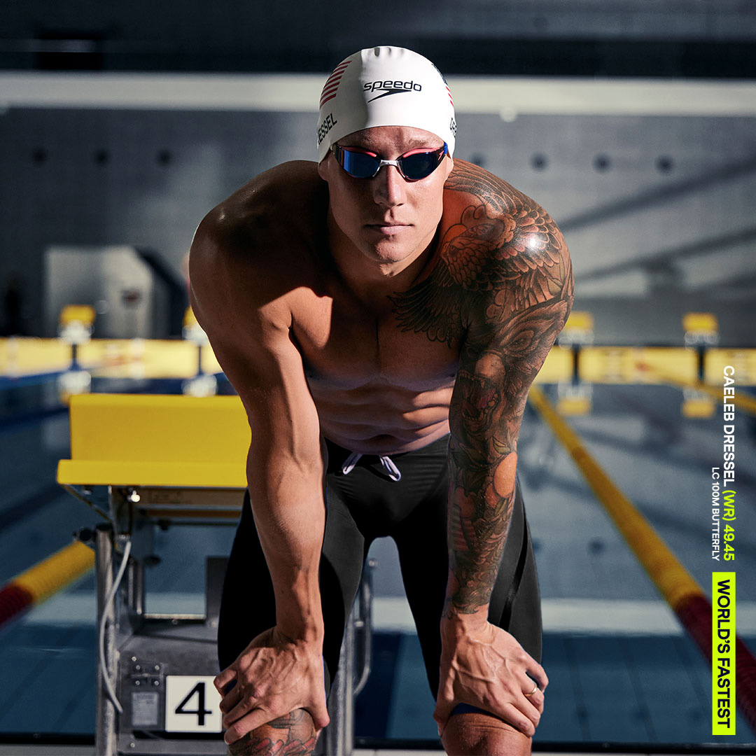 Man bending to touch his knees wearing Speedo Fastskin LZR Pure Intent 2.0 High Waisted Jammer - Black / Iridescent -Front view