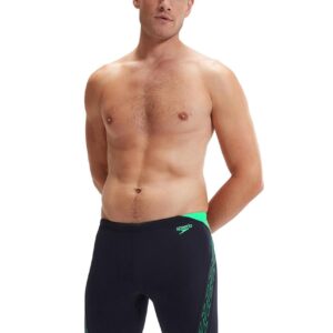 Man with his hands behind back wearing Speedo HyperBoom Splice Jammer - Navy / Green