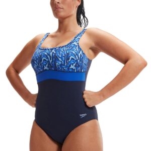 Lady with hands on hips wearing Speedo Shaping Contour Eclipse Swimsuit - Navy Blue / Blue