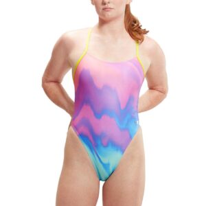 Woman with hands tied back wearing Speedo Allover Digital Tie Back Pastel Ripples Swimsuit - Pink / Blue
