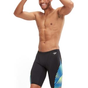 Man smiling holding goggles wearing Speedo Allover Digi V-Cut Jammer - Black / Blue