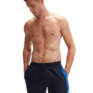 Man looking down wearing Speedo HyperBoom Splice 16" Watershort - True Navy / Tru Cobalt / Picton Blue